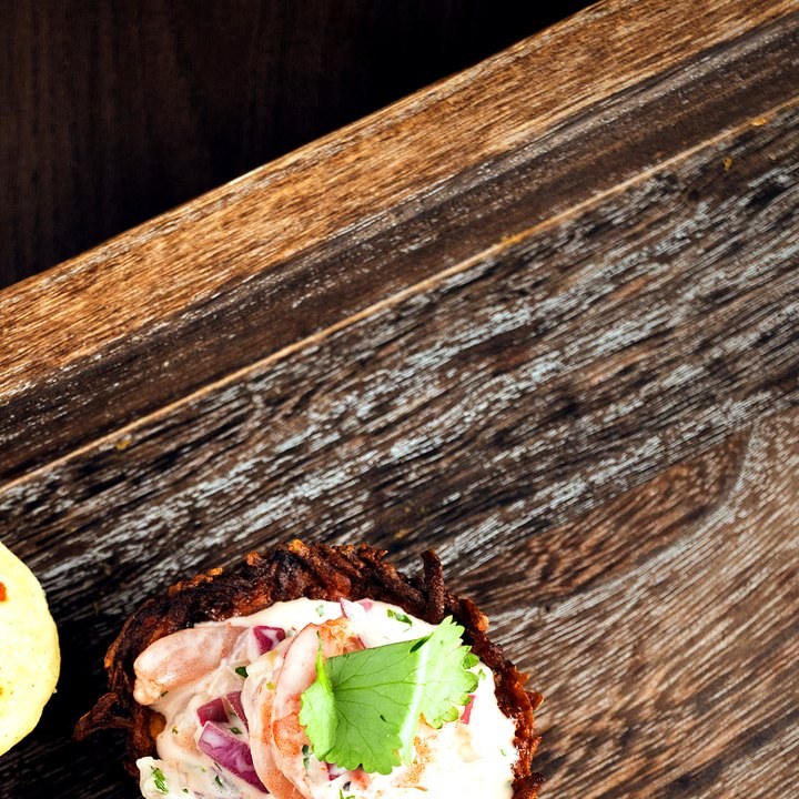 Colombian ceviche served over a crispy tostón